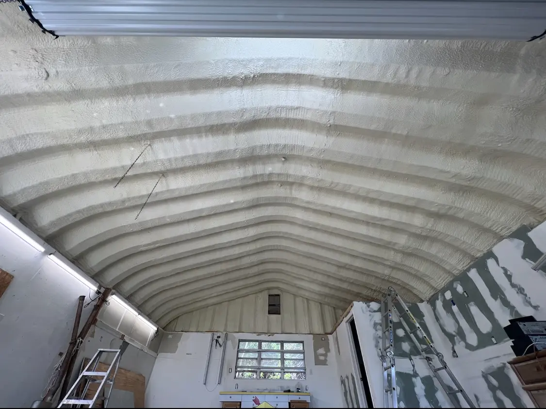 Spray polyurethane foam applied to the underside of a metal roof deck in Oak View